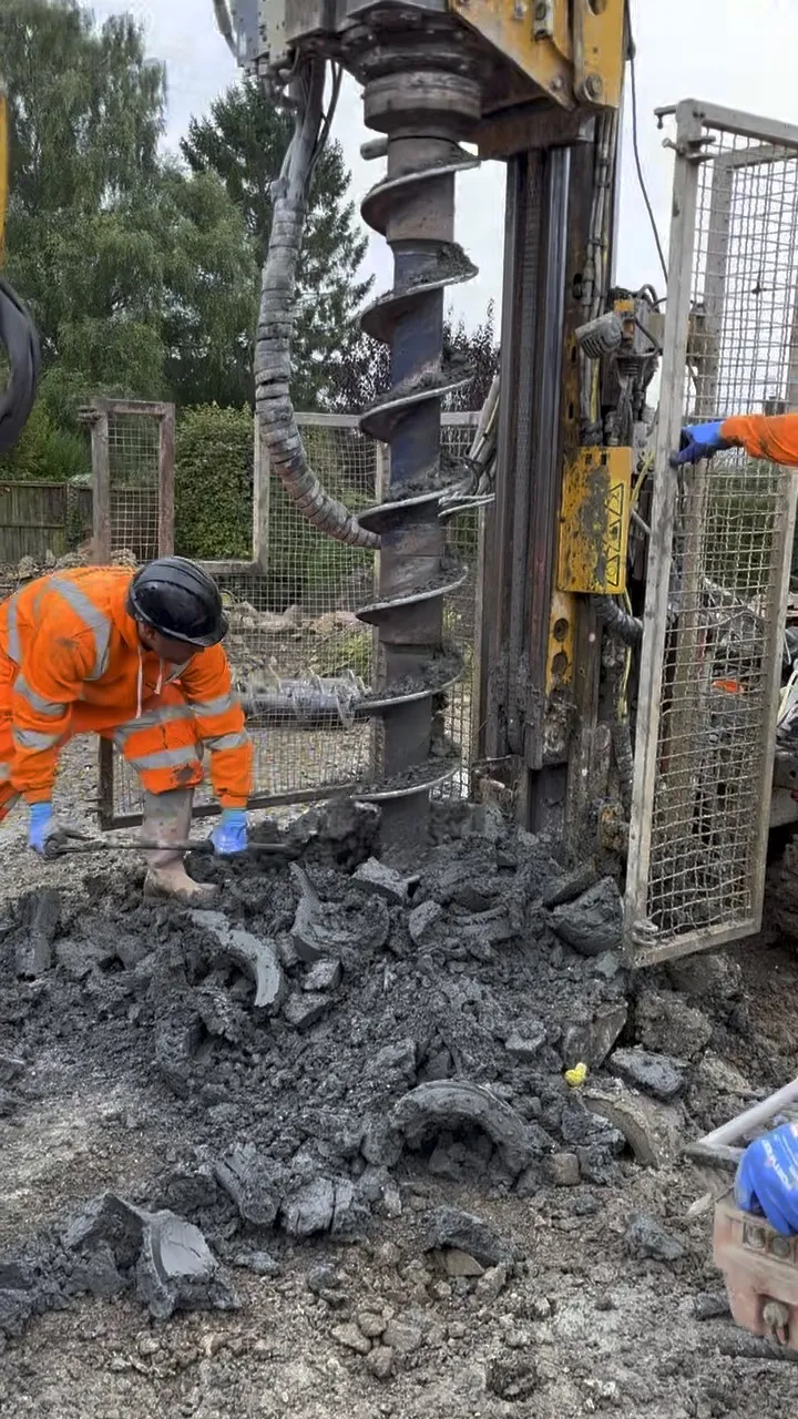 Piling rig boring through heavy clay