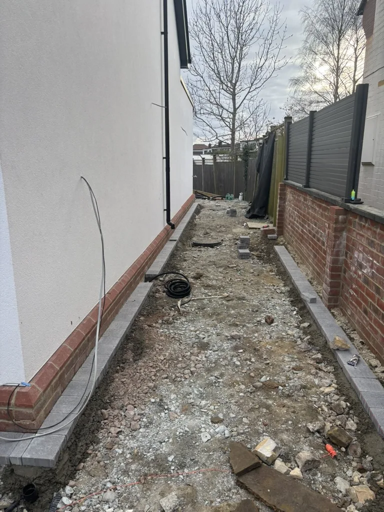 Render finished and the driveway going in down the side of the house